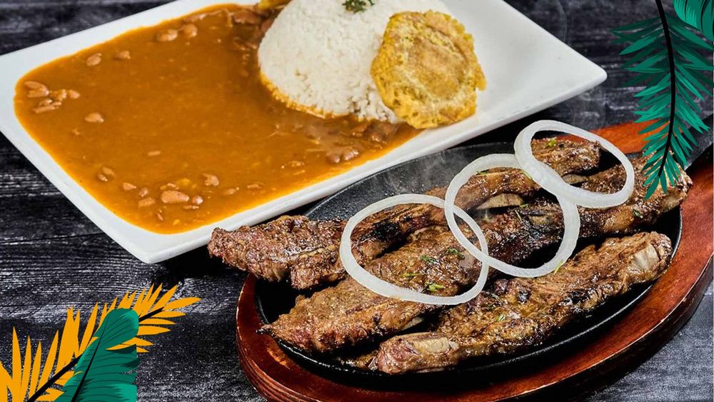 Plato de menestra y parrilla de Cabo Restaurant